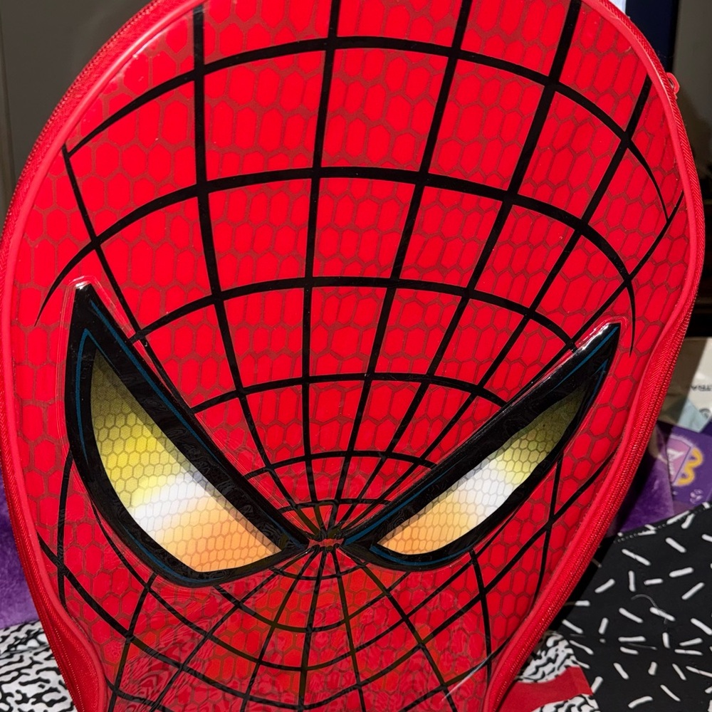 Red Spider-Man Face rolling suitcase